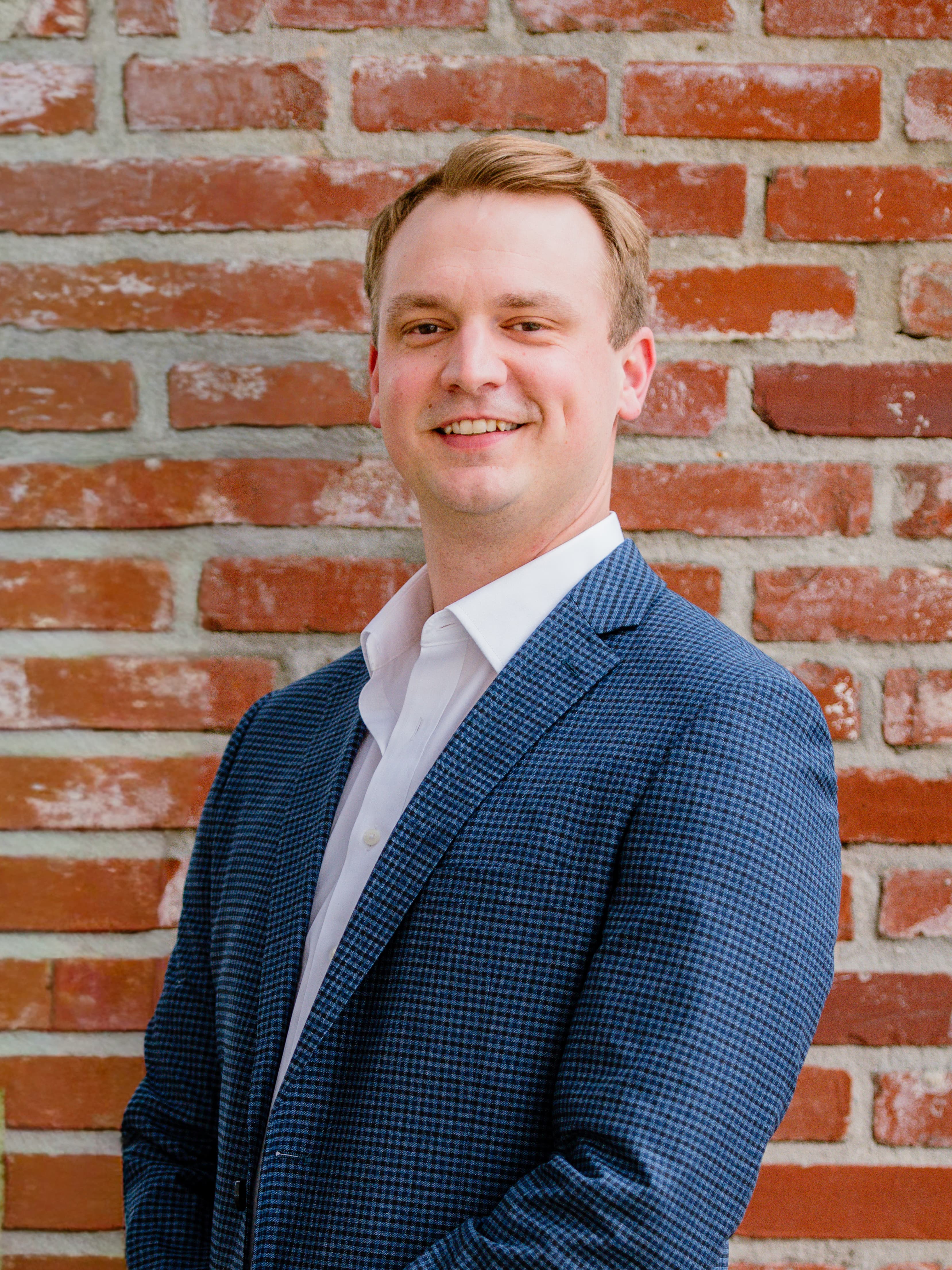 Headshot of Kaleb Hall, VP of Finance at McInnis Construction LLC