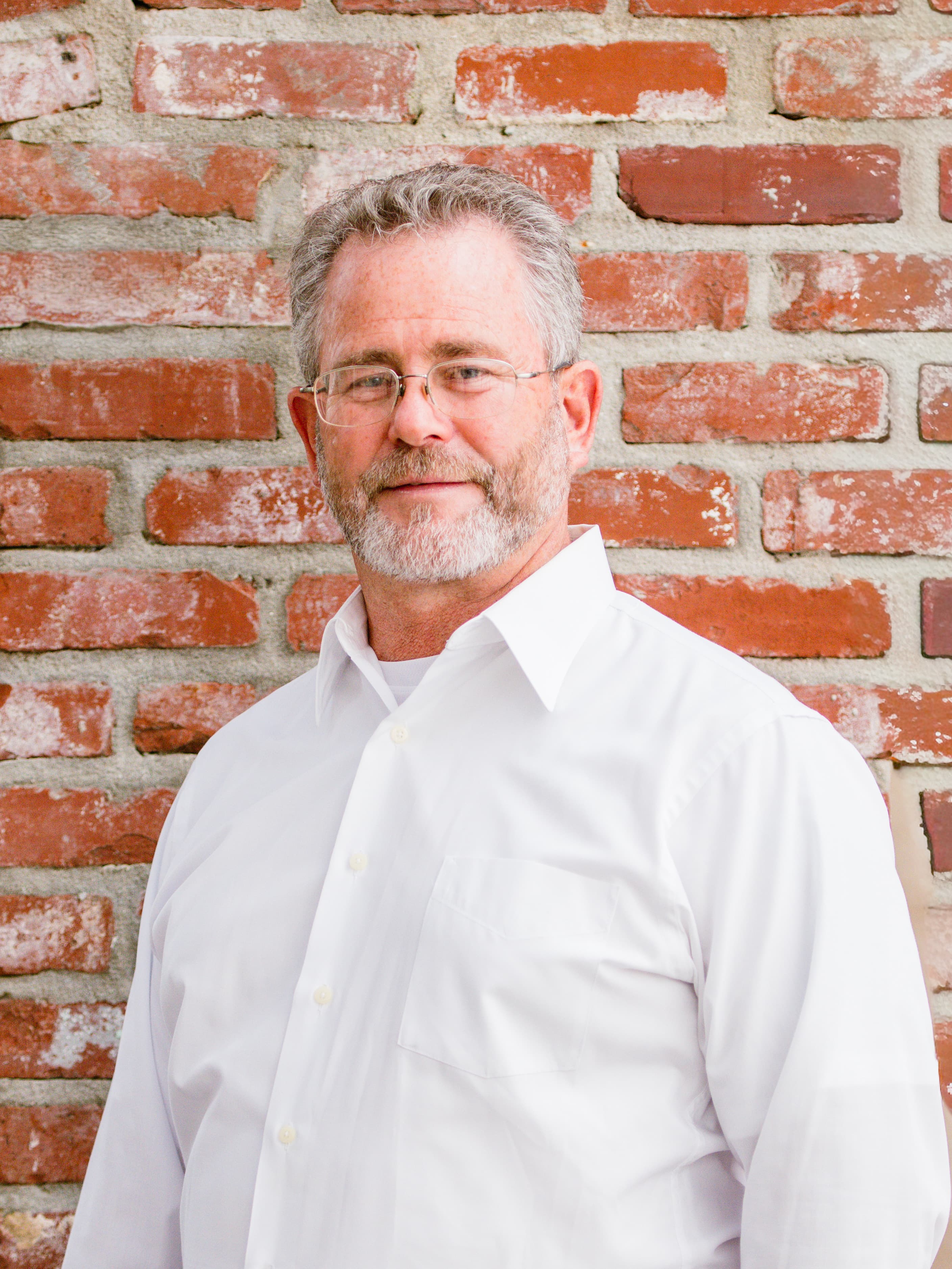 Headshot of Ron Bartholomew, Chief Surveyor at McInnis Construction LLC